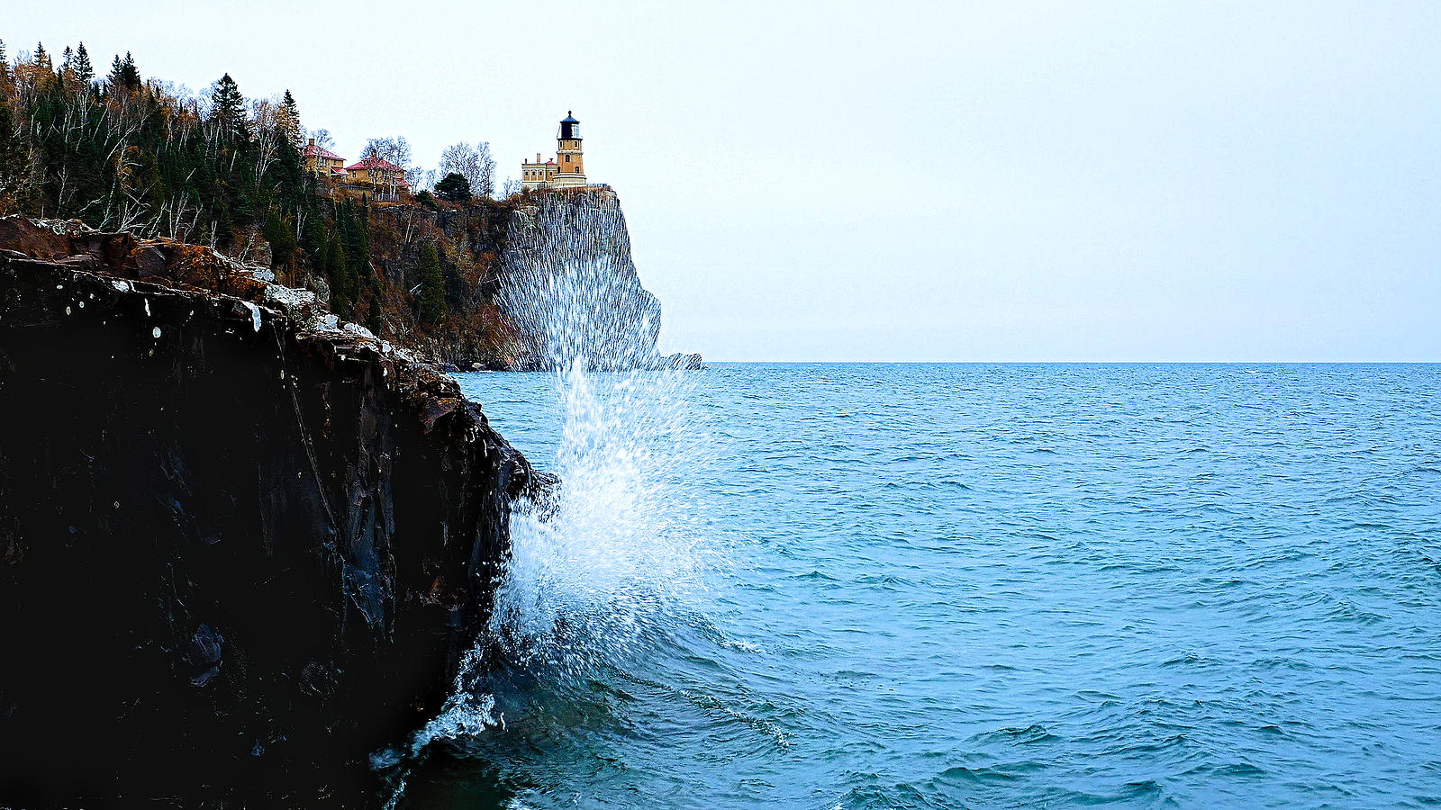 Waves break on shoreline at Split Rock Lighthouse on the north shore of Lake Superior near Duluth and Two Harbors, Minnesota.