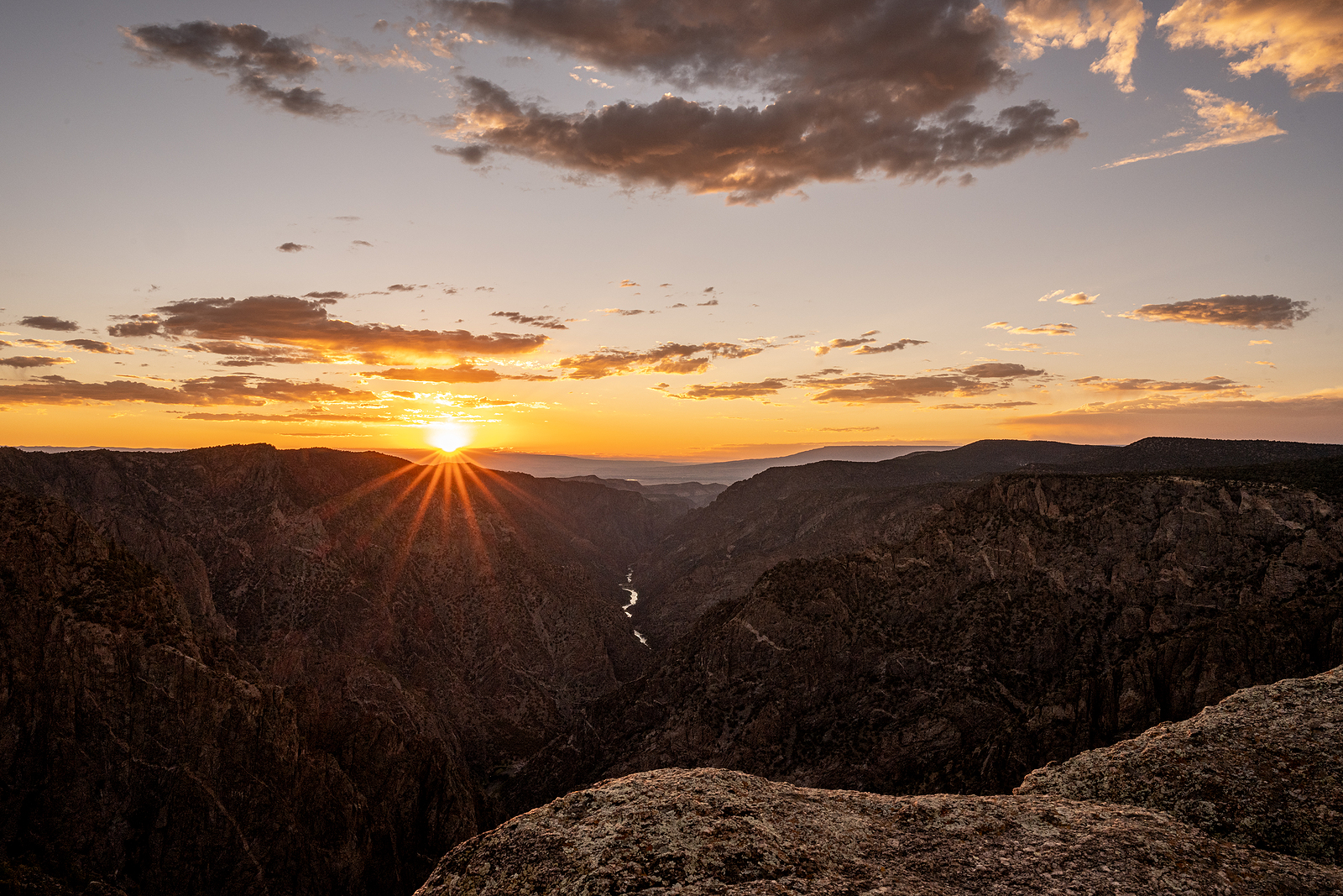 Burst Of Light On The Horizon At Sunet View In Black Canyon Of T