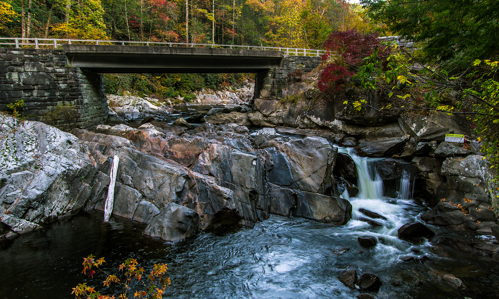 Great Smoky Mountains Road Trip. Bridge over the roadside Sinks waterfall on Little River Road in the Great Smoky Mountains National Park. Gatlinburg, Tennessee.